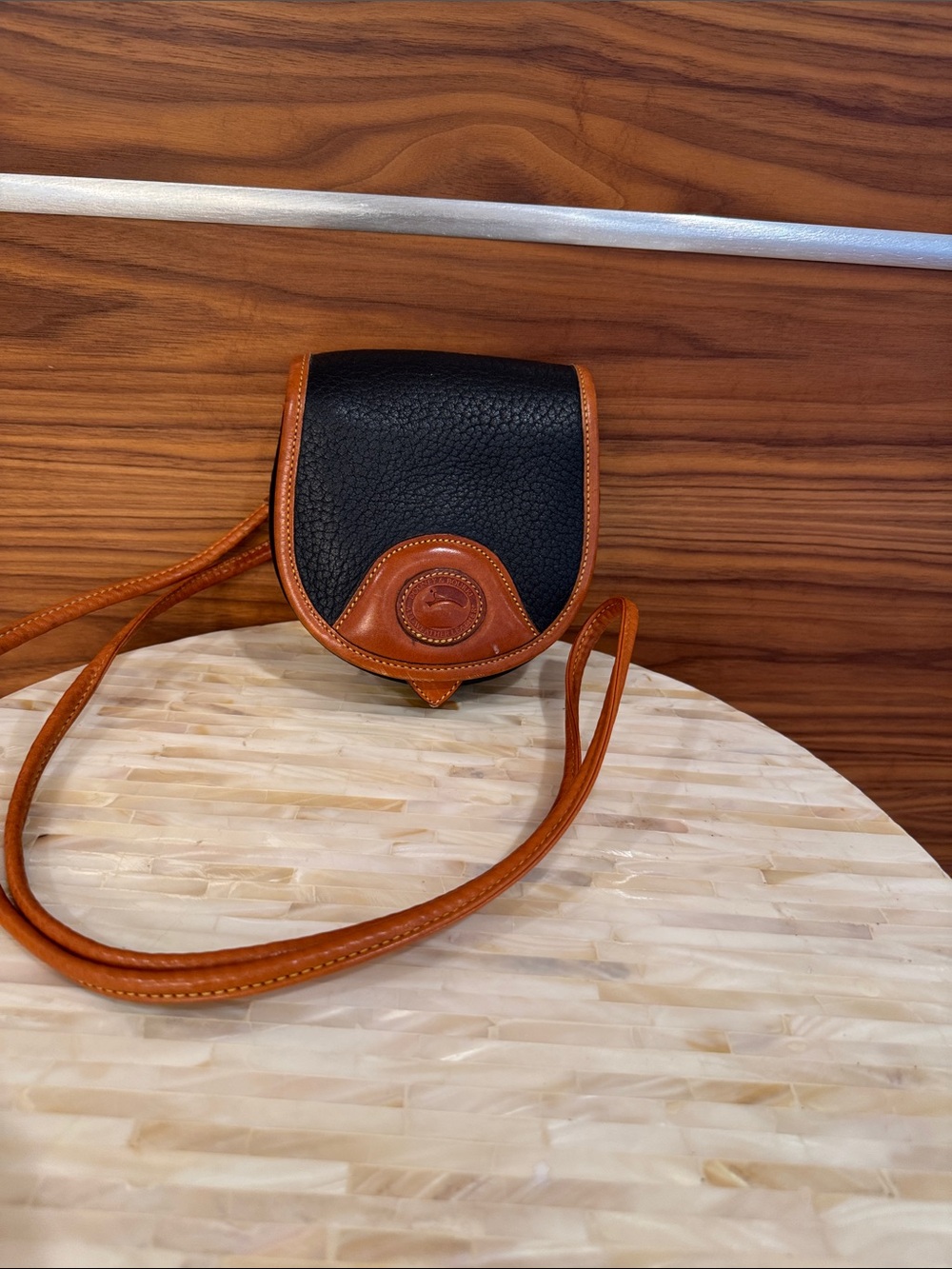 Dooney Bourke Black & Brown Leather Crossbody Bag - Classic Women's small bag.